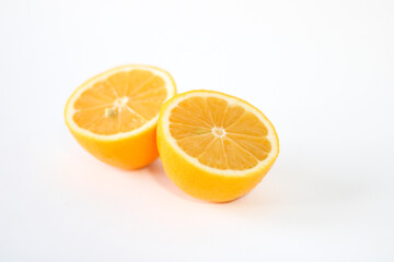 Fresh yellow lemon on a white background.  Close-up photo