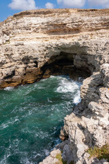 High limestone coastal cliffs against the backdrop of the Black Sea on Tarkhankut, Atlesh, western Crimea