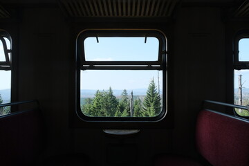 View on a valley from a window of an old train