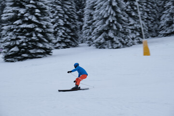 Skier carving on a slope