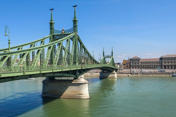 Budapest, Hungary - 15.05.2015: Liberty Bridge across Danube river on a cloudless sunny day of summer.
