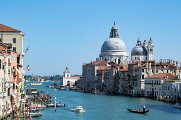 Fototapeta na wymiar View of the basilica of santa maria della salutecity from the grand canal in Venice