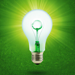 Tło odnawialnych źródeł energii,  zielona żarówka. - obrazy, fototapety, plakaty