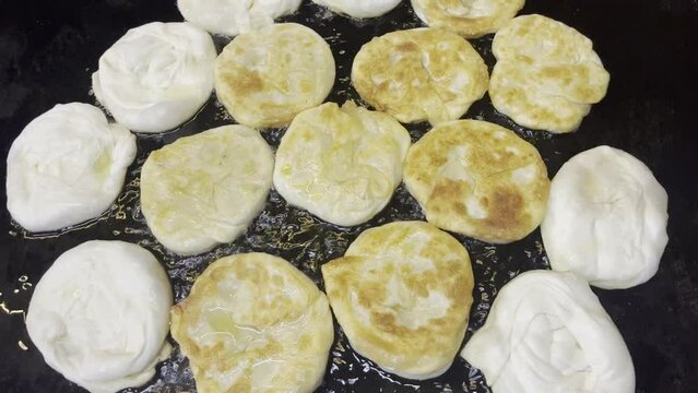 food  (Parotta)  in the pan