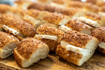 coffee break hotel during conference meeting, corporate revent with tea and coffee catering, decorated catering banquet table with variety of different pastry and bakery, with croissants and cookies