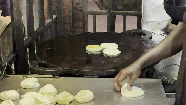 food  (Parotta)  in the pan