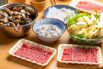 Homemade hot pot with seafood and meat