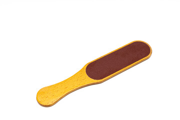 pedicure foot grater with a wooden handle on a white background