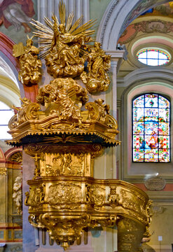 golden baroque pulpit of the basilica of the Wachau, parish church Saint Veit, at Krems, Austria