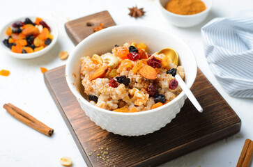 Spelt Porridge with Nuts and Dried Fruit Mix, Healthy Breakfast