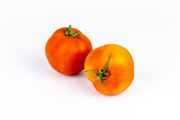 Tomatoes isolated on white background with clipping path. Ripe red tomatoes.