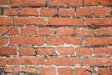 Obraz premium Red brick wall texture, abstract brickwork. Brick wall of an old building. Selective focus.