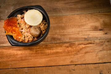 Typical lechona from Tolima with rice