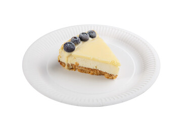 A piece of cheesecake decorated with blackberries