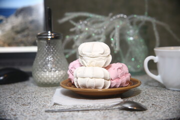 Close up cup of tea and sweet marshmallow dessert sugar
