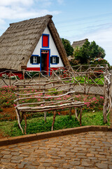 Fototapeta na wymiar Traditional triangular rural house at Madeira island, Portugal