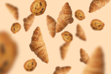 Falling fresh baked croissants with cheese. French pastry concept. Bakery pattern with baked croissant. Fresh baked croissants.