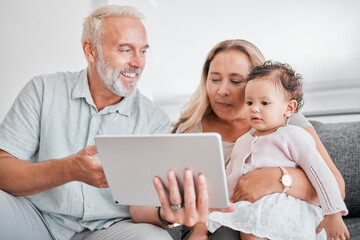 Family, tablet and baby with grandparents on sofa in home on social media, streaming movie or educational app. Relax, love and grandpa, grandma and infant or child with touchscreen tech for cartoons.