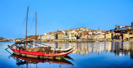 Oporto medieval city cityscape - Rabelo boat in Douro river - Porto, Portugal - obrazy, fototapety, plakaty
