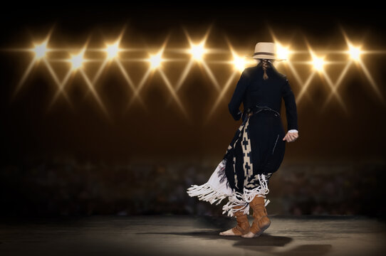 Argentine Malambo dancer stage performance in traditional Gaucho clothing - Traditional dance of Argentine cowboys