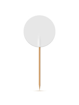 White round flag on wooden toothpick. Round paper topper for cake or other food isolated on white background. Blank mockup for advertising and promotions, location mark, map pointer
