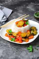 Rice with Vegetables Asian Style, Vegetarian Meal on Dark Background