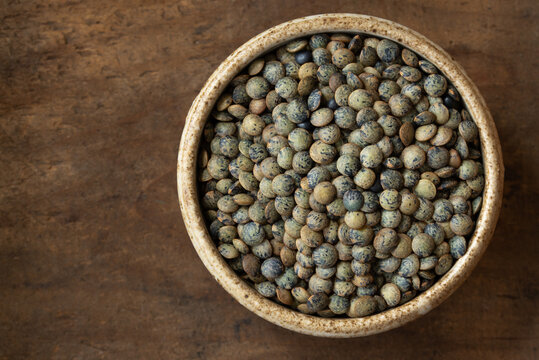 Uncooked French Green Lentils in a Bowl