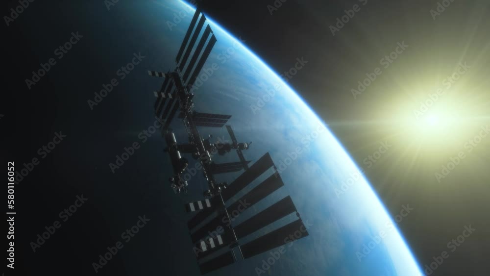 Wall mural international space station iss floating in orbit above planet earth in outer space
