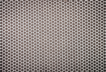Perforated metal grid with circular holes, Metal texture background.