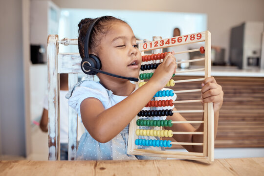 Education, house and child learning math with a colorful child development toy for numbers counting. Headphones, mathematics or creative young kindergarten student home schooling busy with assessment