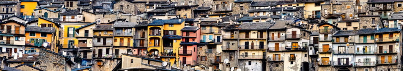 Fototapeta na wymiar Tende village, Alpes-Maritimes, France - Picturesque medieval architecture background with houses stacked on a hill