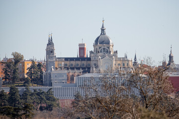 Fototapeta na wymiar Panoramic view of the almudena cathedral of Madrid from the natural environment of Casa de Campo