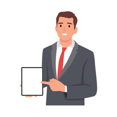 Happy confident business man showing a blank screen tablet computer and pointing towards it. Business man standing isolated in white background holding empty screen tablet PC