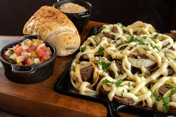 Appetizer - Portion of filet mignon with cream cheese