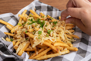 Appetizers - French Fries with Sausage and Parmesan Cheese Gratin