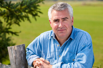 Close up portrait of mature man outdoors.