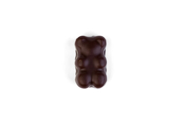 Souffle candy in chocolate in the shape of a bear on a white background.