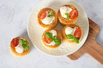 puff pastry vol-au-vents stuffed with tomatoes