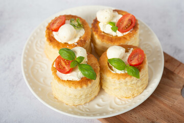 puff pastry vol-au-vents stuffed with tomatoes