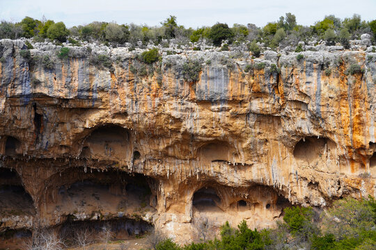 Ponor cliff of upside down world (aşağı d&uuml;nya obruğu) in Turkey Mersin Silifke, some caves and trees