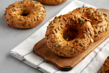 Homemade Pumpkin Seed Bagels Ready to Eat, side view.