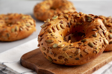 Homemade Pumpkin Seed Bagels Ready to Eat, side view. Close-up.