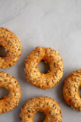 Homemade Pumpkin Seed Bagels Ready to Eat, top view. From above, overhead, flat lay. Copy space.