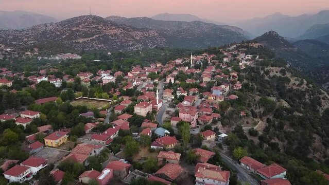The aerial video of Ormana village in the mountains of Turkey is undeniably charming, with its quaint houses and picturesque streets nestled among the rolling hills.