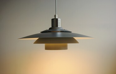 Grey colored hanging pendant lamp in Scandinavian design. 