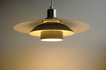 Grey colored hanging pendant lamp in Scandinavian design. 