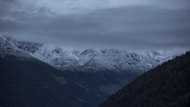 Timelapse of Grand Combin while the sun sets and clouds move in. Shot from Champex Lac, Switzerland.
