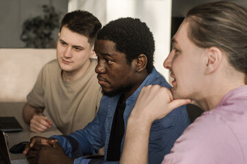 Obraz premium Programmers working in the office of a software development company. Coding technologies, site design. Successful diverse Teamwork. Cyberspace concept.