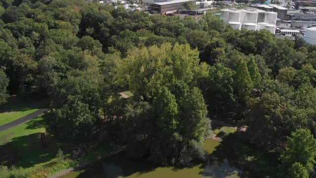 Aerial shot of Fredenbaumpark with Dortmund dowmtown in view, Germany.
