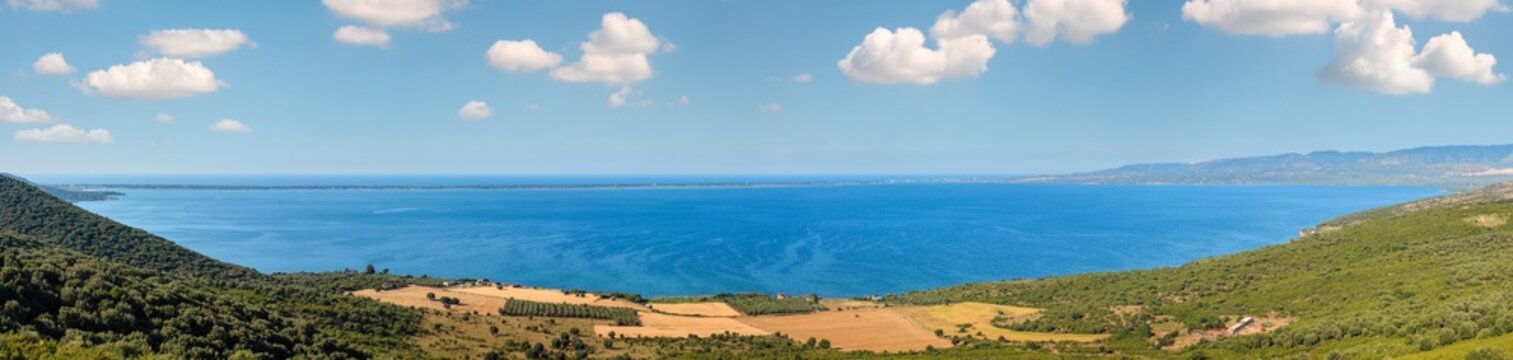 Summer panoramic view of Lago di Varano (Varano lake) on the Gargano peninsula in Puglia, Italy.
